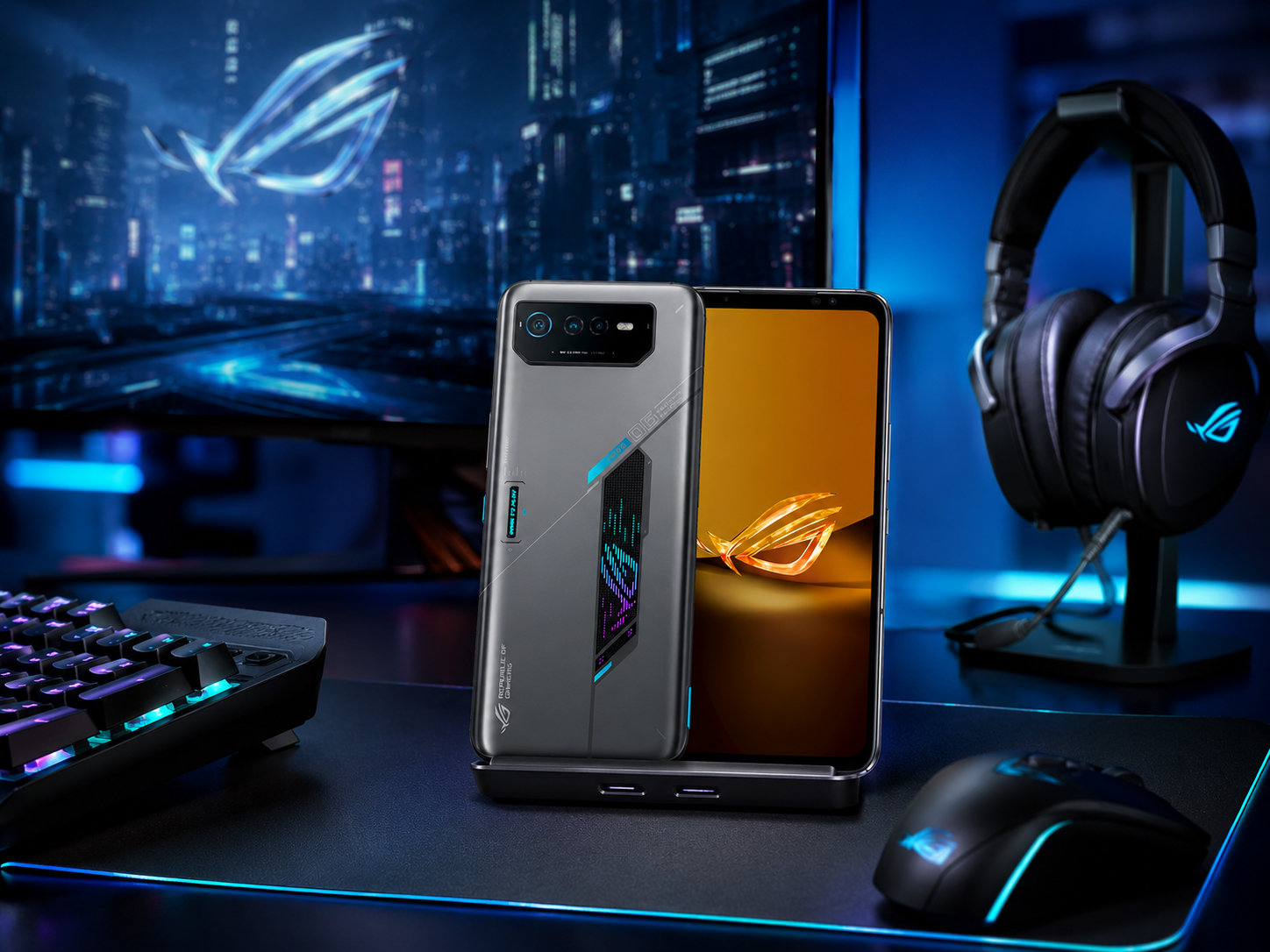 Space gray ASUS ROG Phone 6D smartphone with orange screen and vertical rear camera