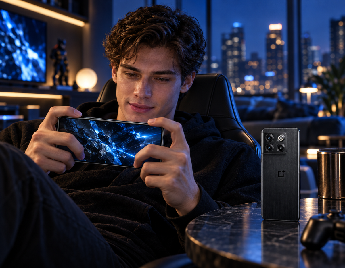 OnePlus Ace Pro 10T Black smartphone in hands, display with crumpled-shard wallpaper, triple rear cameras